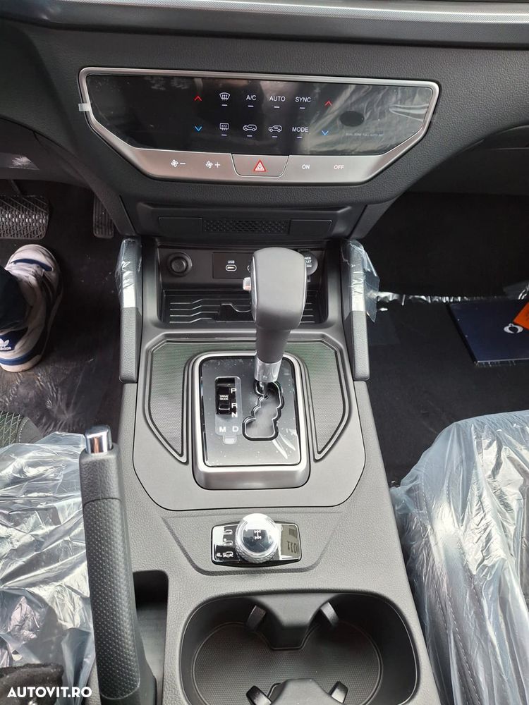 KG Mobility Musso - 12