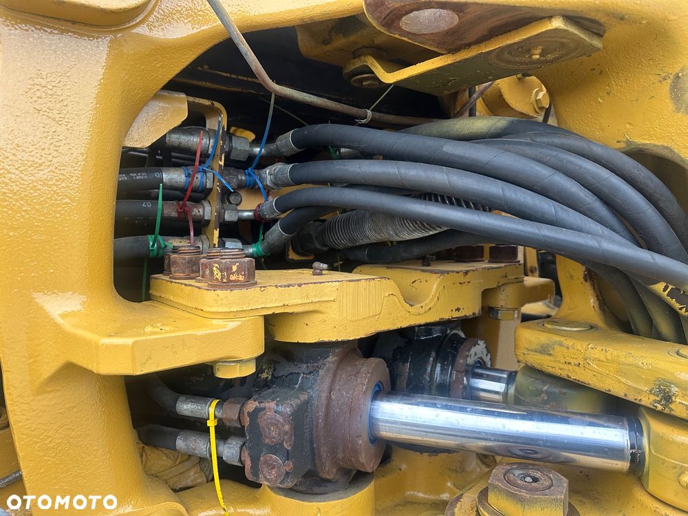 Caterpillar Cat 428 E - 15