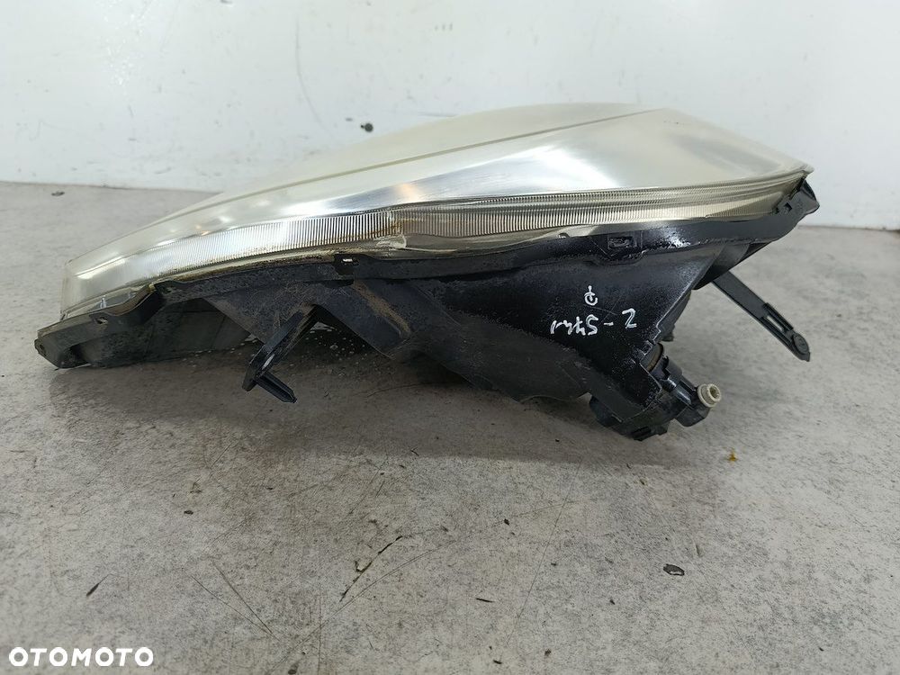 LAMPA PRZÓD PRAWA RENAULT KANGOO II 8200419910  8200419882 100-16916  KOITO - 7