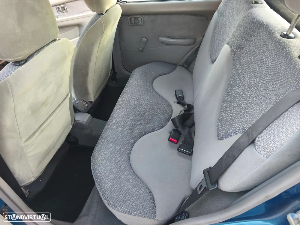 Nissan Micra 1.0 Elegance AC - 12