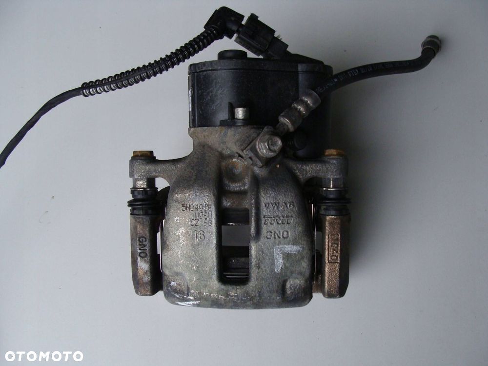 zacisk hamulcowy lewy tył vw tiguan 5n0405e - 1