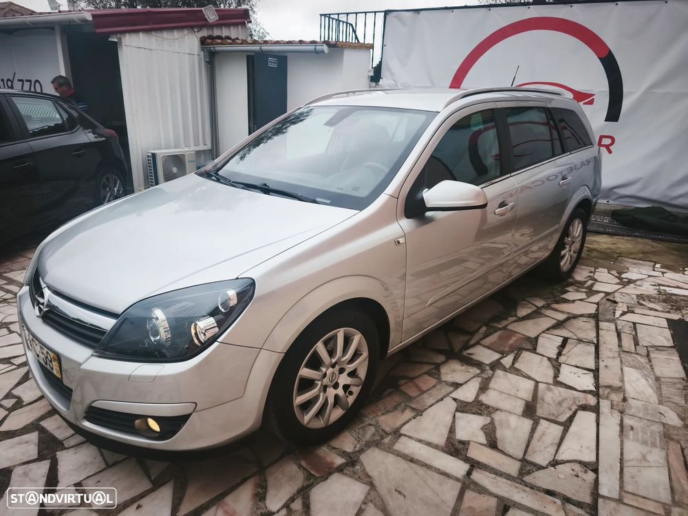 Opel Astra Caravan 1.9 CDTi Cosmo - 1