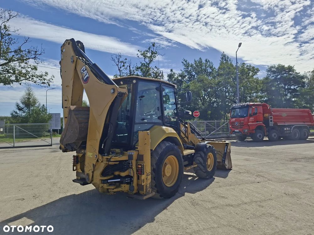 Caterpillar 428 - 15