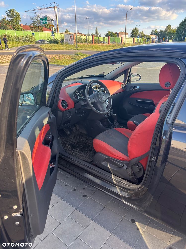 Opel Corsa 1.4 16V Cosmo - 11