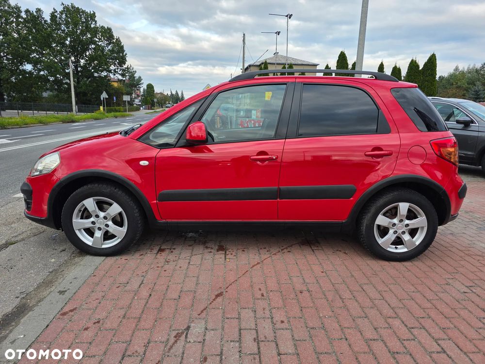 Suzuki SX4 1.6 Comfort Plus - 8