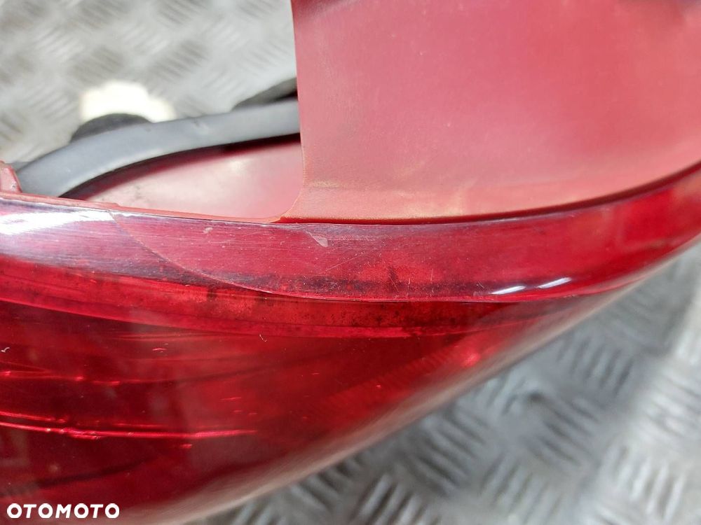 LAMPA LEWY TYŁ + WKŁAD OPEL CORSA D 13186350 89037853 - 5