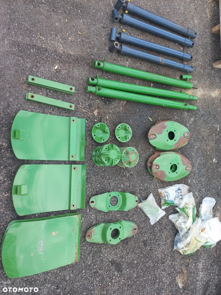 Części kosiarki KRONE ,dysk,ślizg,siłowniki,śruby,200310611,płoza,2535663,trzymak noża,200361700,934138.siłownik podnoszenia.