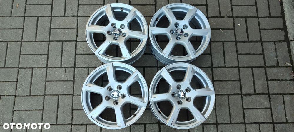 FELGI ALUMINIOWE 5x100 6Jx15 CALI 6R0601025C ET40 fi 57.1 SKODA FABIA RAPID ROOMSTER SEAT IBIZA ARONA VW POLO FOX KOMPLET 4 SZTUKI - 1