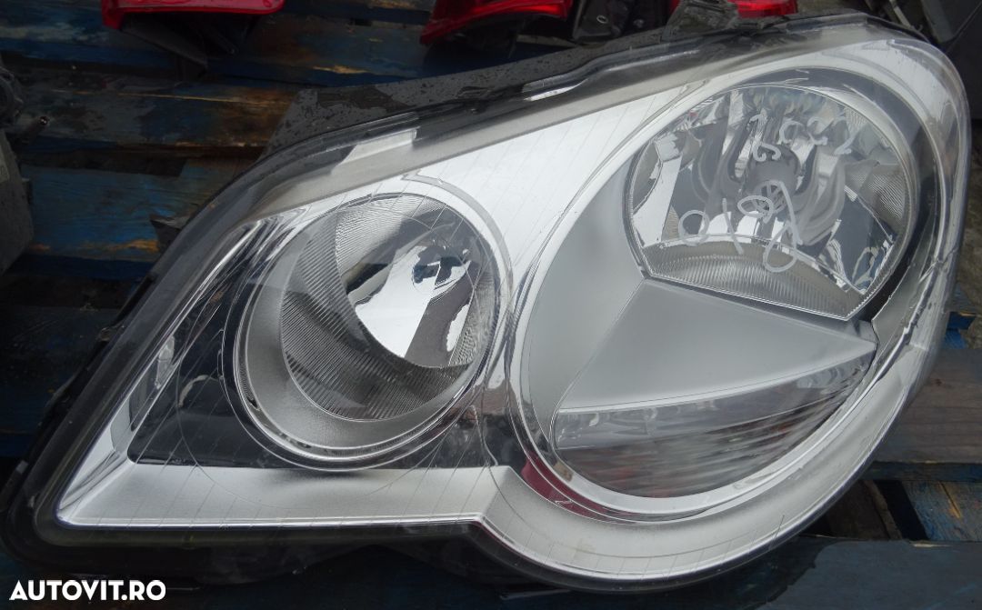 Far stanga Volkswagen Polo din 2008 volan pe stanga - 1