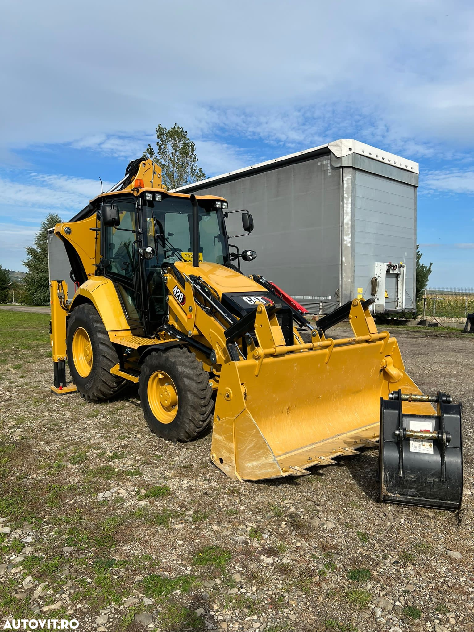 Caterpillar 428 - 4