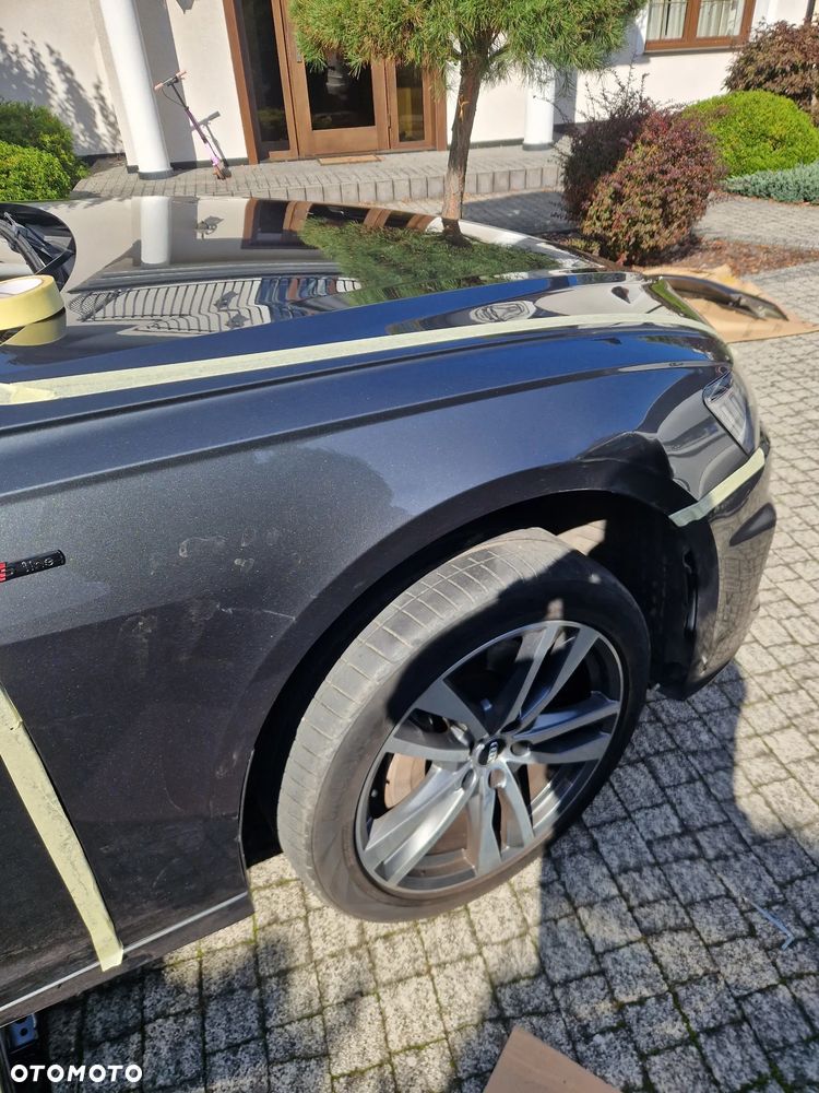 Błotnik prawy Audi A6 C8 lakier LZ7S - 1