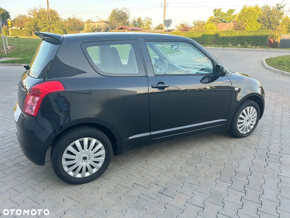 Suzuki Swift 1.3 Comfort+ - 11