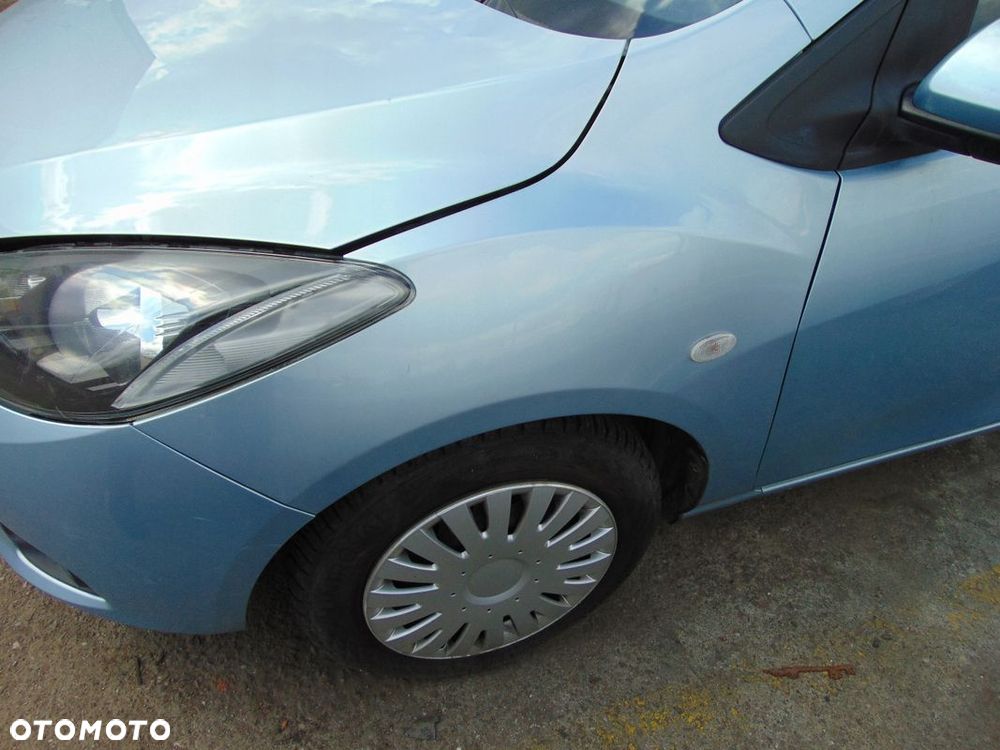 BŁOTNIK LEWY PRZÓD PRZEDNI MAZDA 2 II 33Y - 1