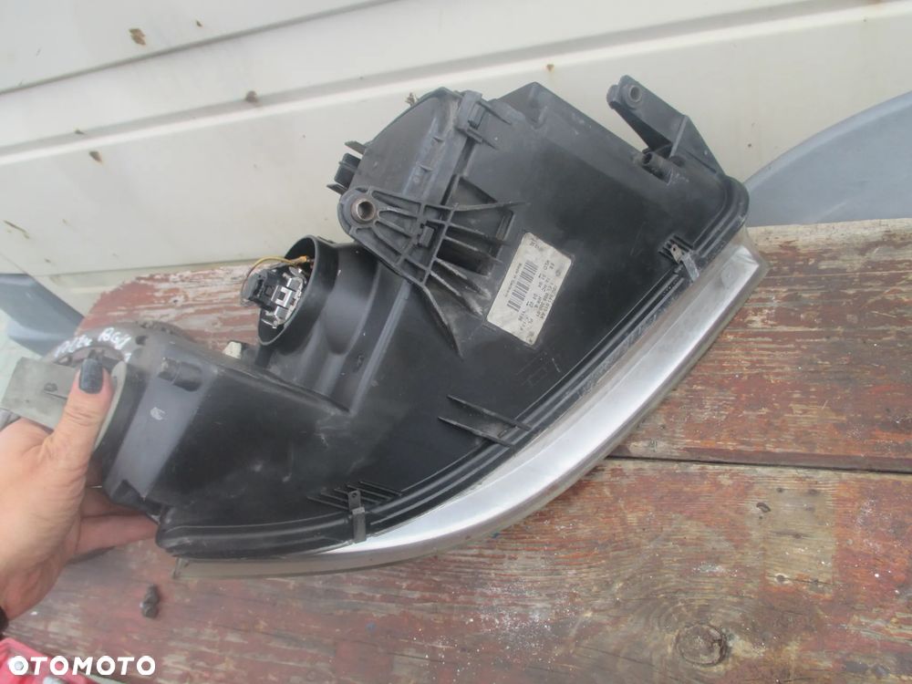 lampa lewa VW Passat B5 LIFT Hella Europa - 5