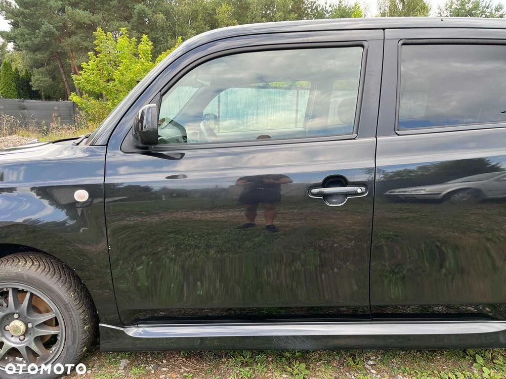 drzwi przód przednie lewe daihatsu materia x07 czarne 2006 - 2011
