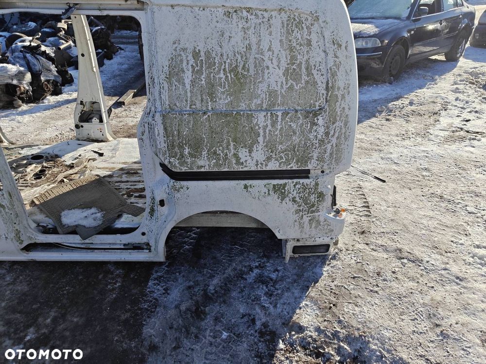 ĆWIARTKA BŁOTNIK LEWY TYŁ NISSAN NV200 - 1