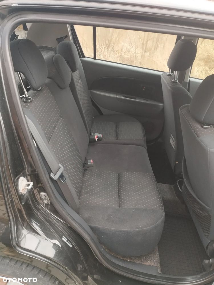 Daihatsu Sirion 1.0 - 16