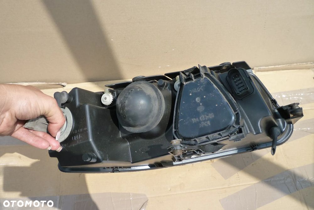 Lampa lewa VW Passat B5 lift Hella Europa - 3