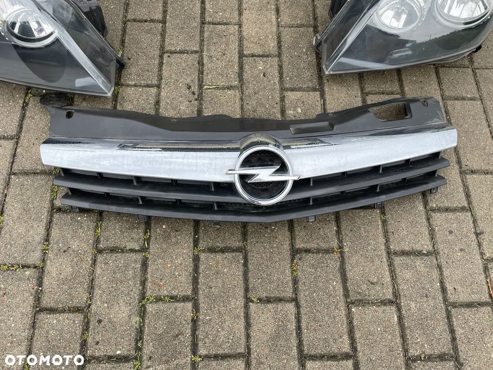 OPEL ASTRA H III LIFT PRZÓD KOMPLETNY ZDERZAK LAMPA REFLEKTOR LEWY przedni GRILL lampa reflektor LEWA PRAWA GTC Hella Z167 - 9