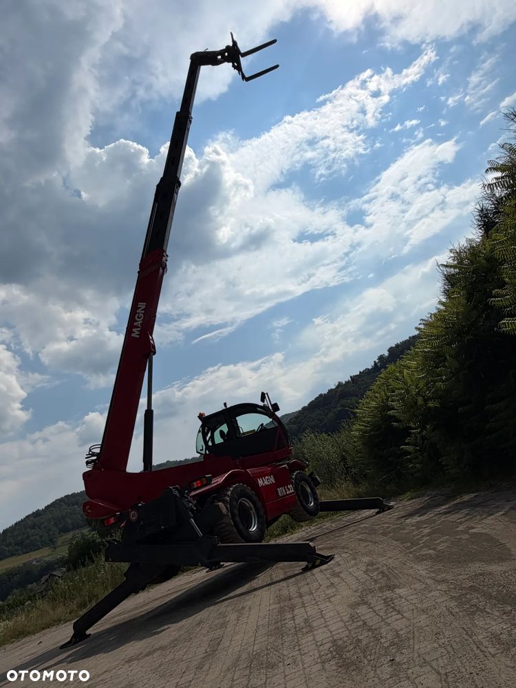 Magni RTH 5.23 SH-D/C Ładowarka teleskopowa Obrotowa roto 23 metry wysuw. 5 ton Udźwig. Wciagarka Hydrauliczna 5 ton. Pilot zdalnie sterowana. DEUTZ Silnik 145 KM. Jak Nowa Z Norwegii 2019 rok. 3200 mtg. Serwisy DEKRA TUV aktualne. Full Wypas. Klima stabilizatory 2 osie. Pilot. Maszyna z Norweskiej Upadłośći. Stan maszyny nie różni się od nowej z Salonu! Zero luzów na wszystkich siłownikach i podzespołach. ani deka wycieków. OKAZJA. Pełna Dokumentacja - 8