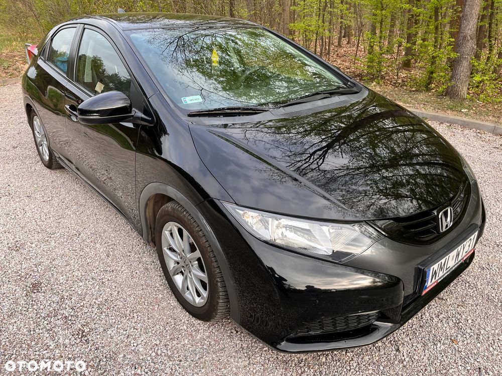 Honda Civic 1.4 i-VTEC Comfort - 1