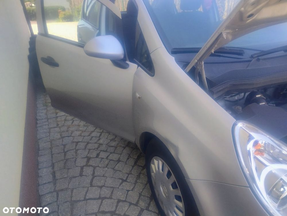 Opel Corsa 1.2 16V Cosmo - 6
