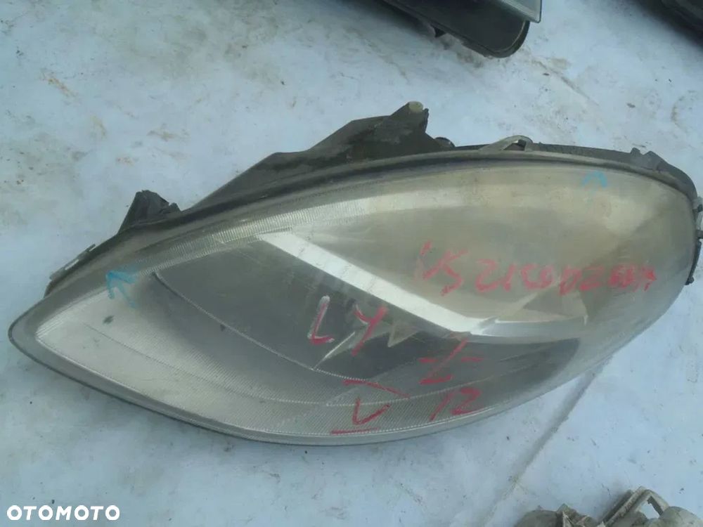 lampa reflektor fiat seicento lancia ypsilon oryginał - 1
