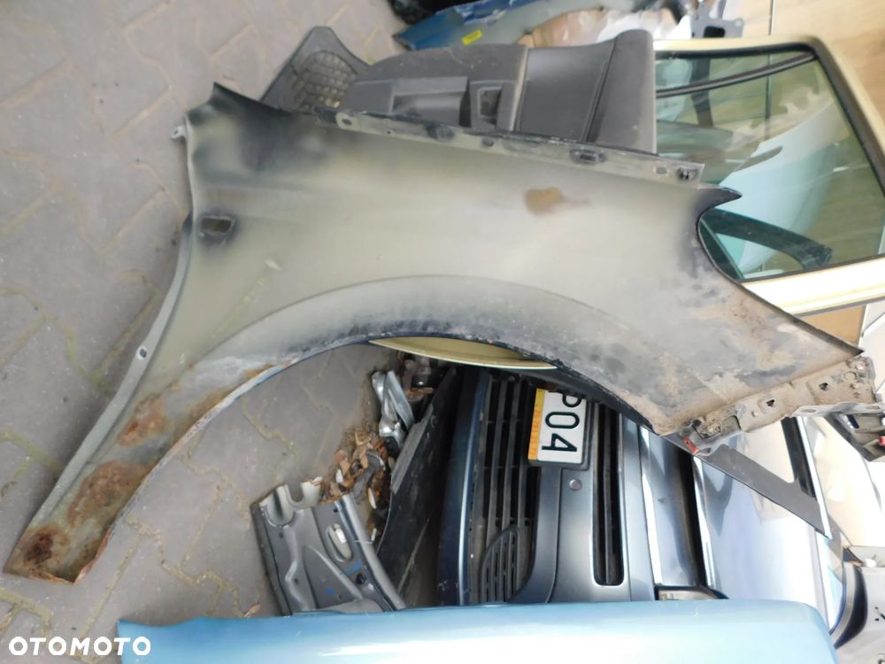 błotnik lewy przód OPEL ASTRA III H z20r - 13