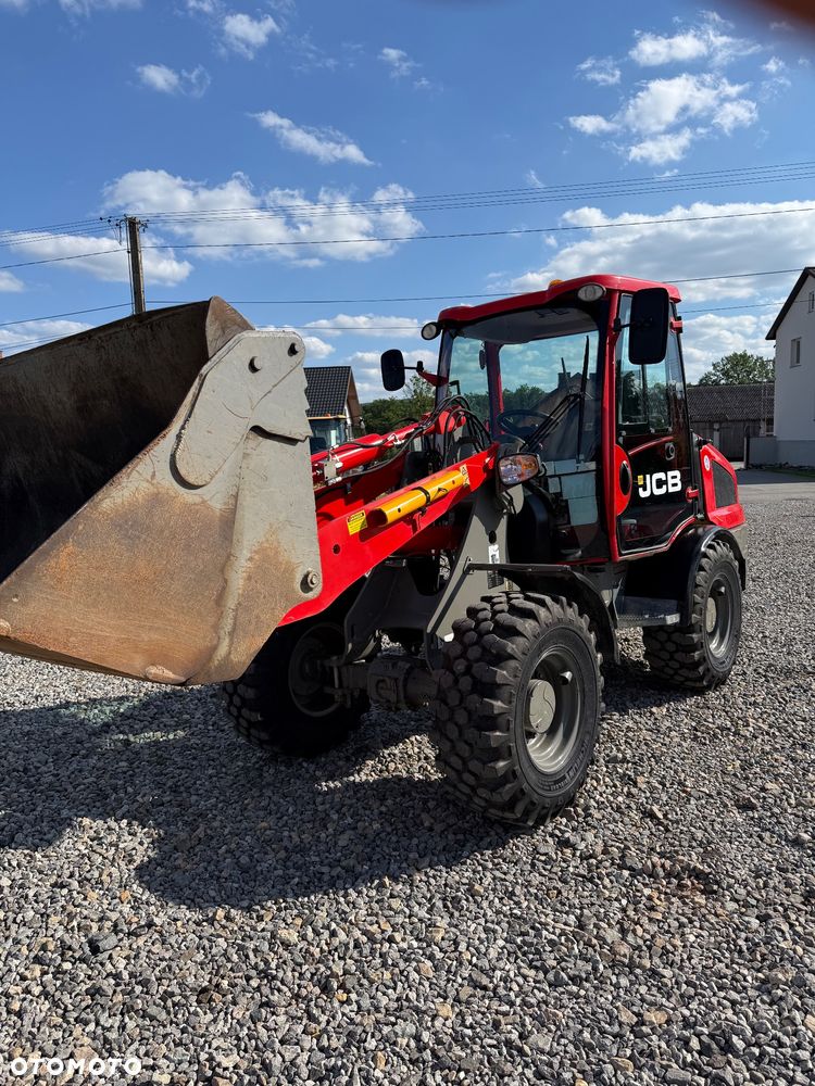 JCB 406 - 1