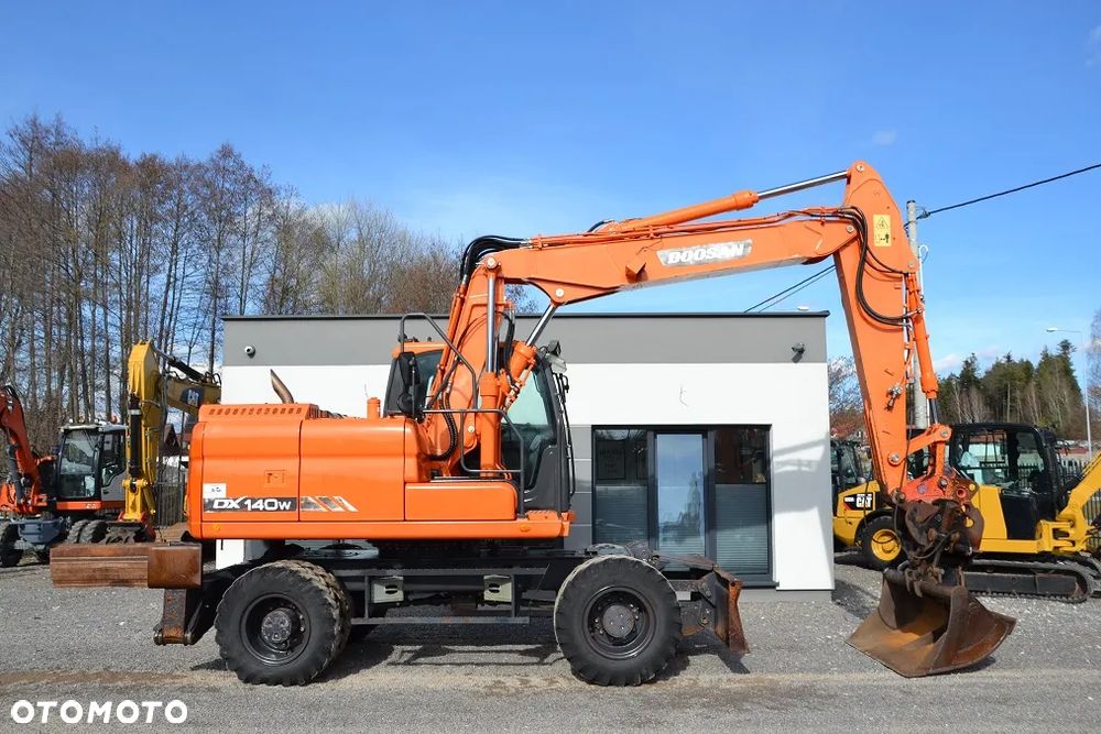 Doosan DX 140 W - 12