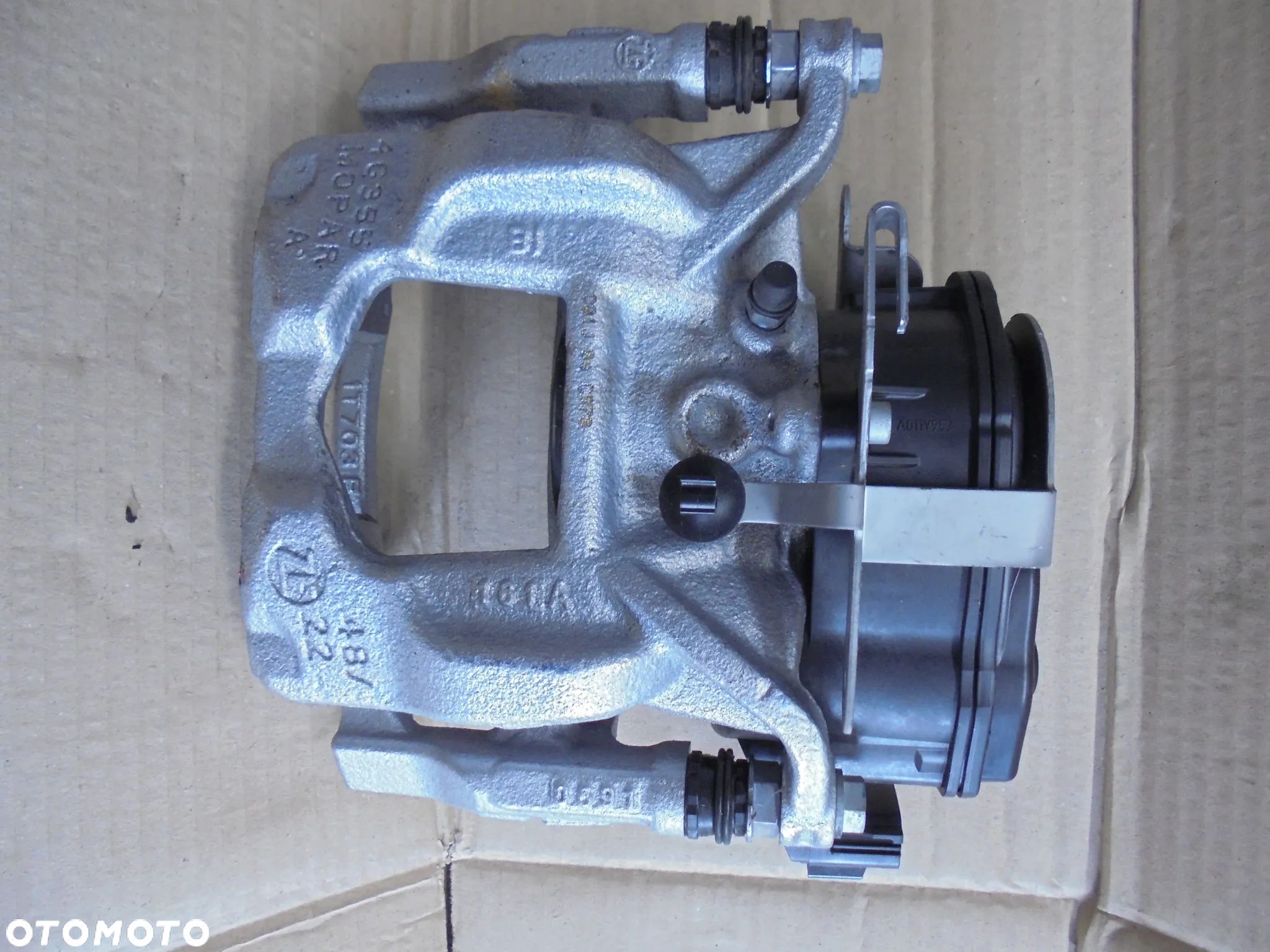 ZACISK HAMULCOWY TYŁ PRAWY ELEKTRYCZNY FIAT DUCATO 2021- 52208195 - 1
