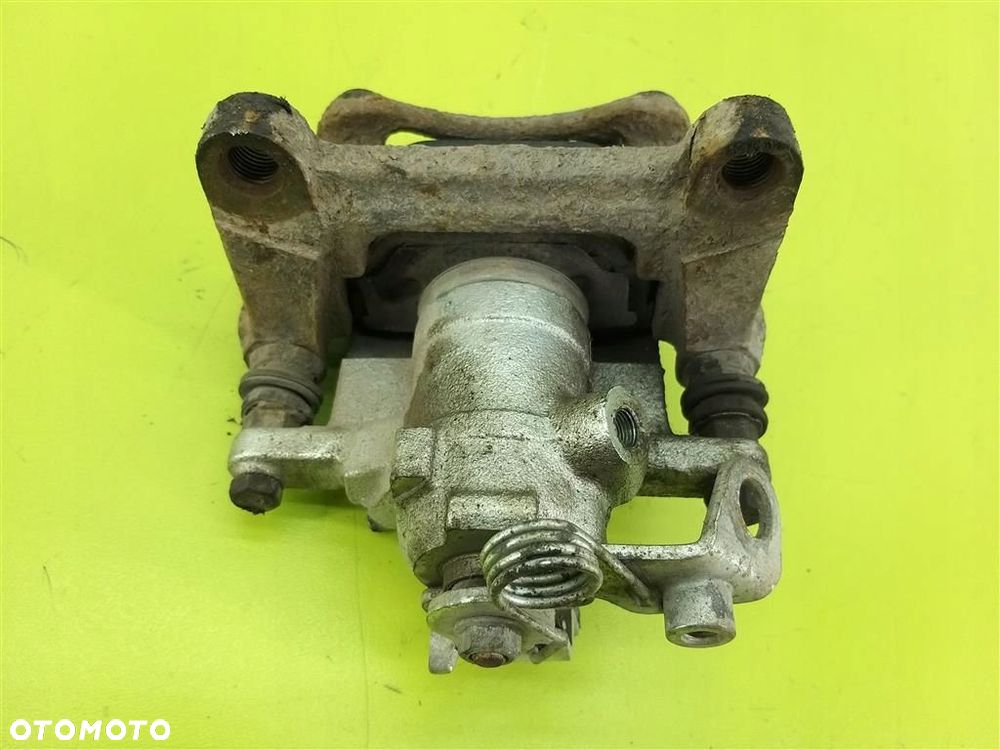 Zacisk hamulcowy tył lewy VW Transporter  T4 1992-2003 - 2