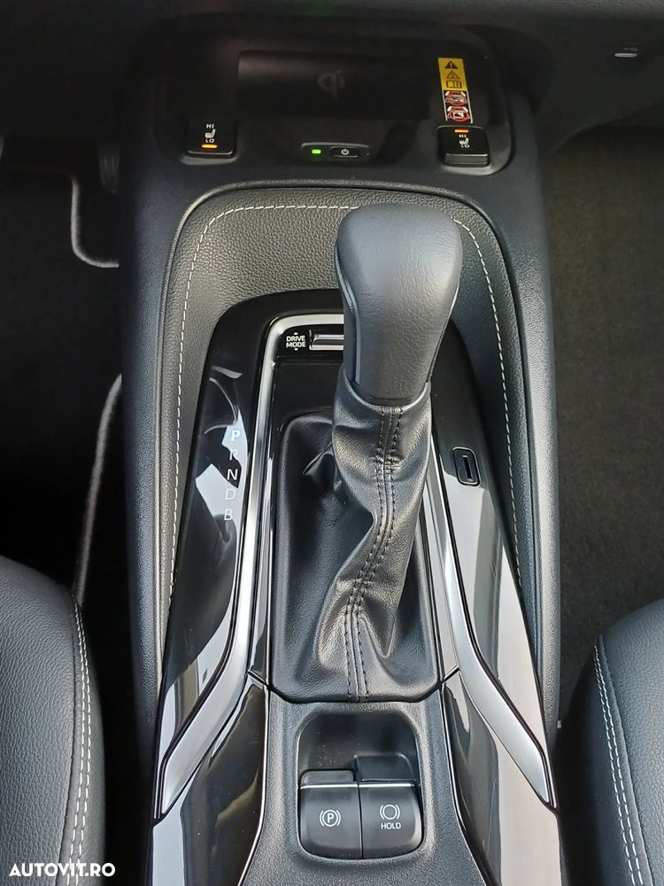 Toyota Corolla TS 1.8 HSD Exclusive - 16