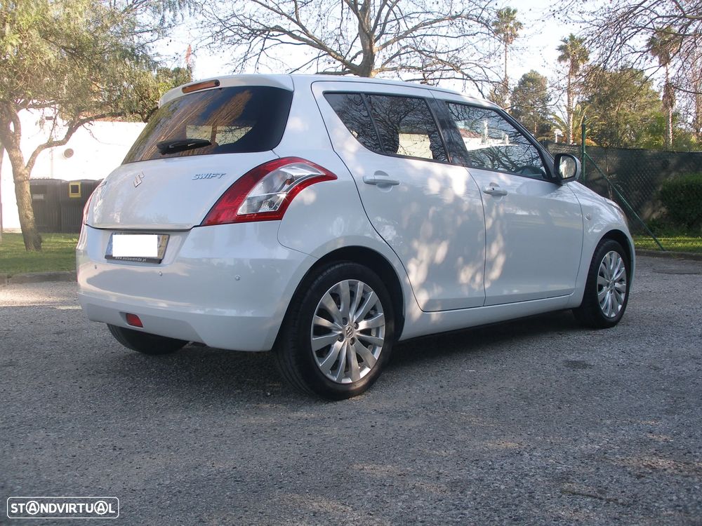 Suzuki Swift 1.2 VVT GLX - 8