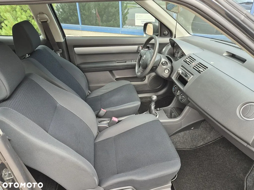 Suzuki Swift 1.3 Club - 6