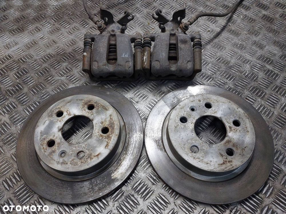 TARCZE HAMULCOWE TYŁ + KLOCKI + ZACISKI OPEL INSIGNIA A - 1