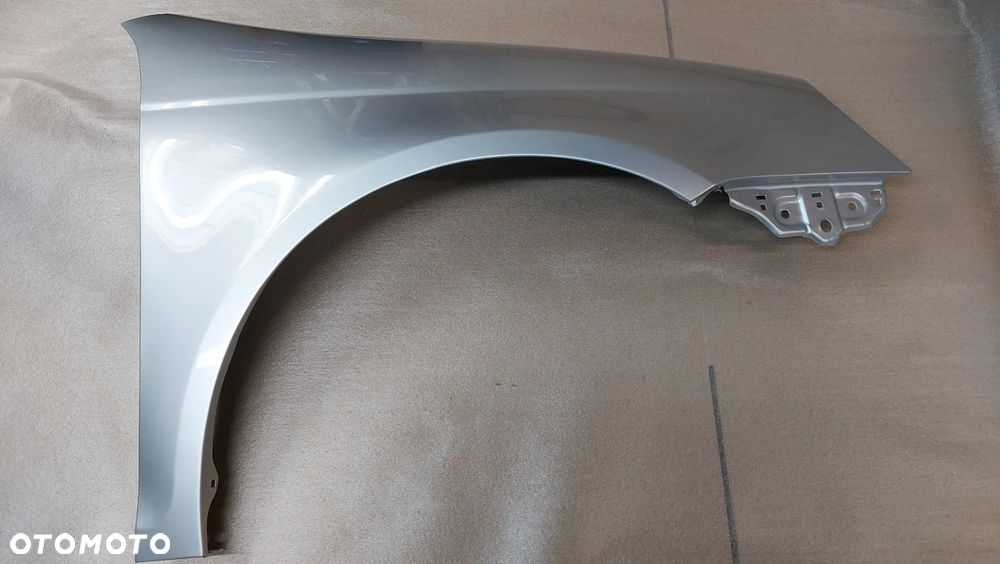 VW GOLF V 5 03-09rok KOMBI BŁOTNIK LEWY LUB PRAWY  LA7W CYNK. - 2