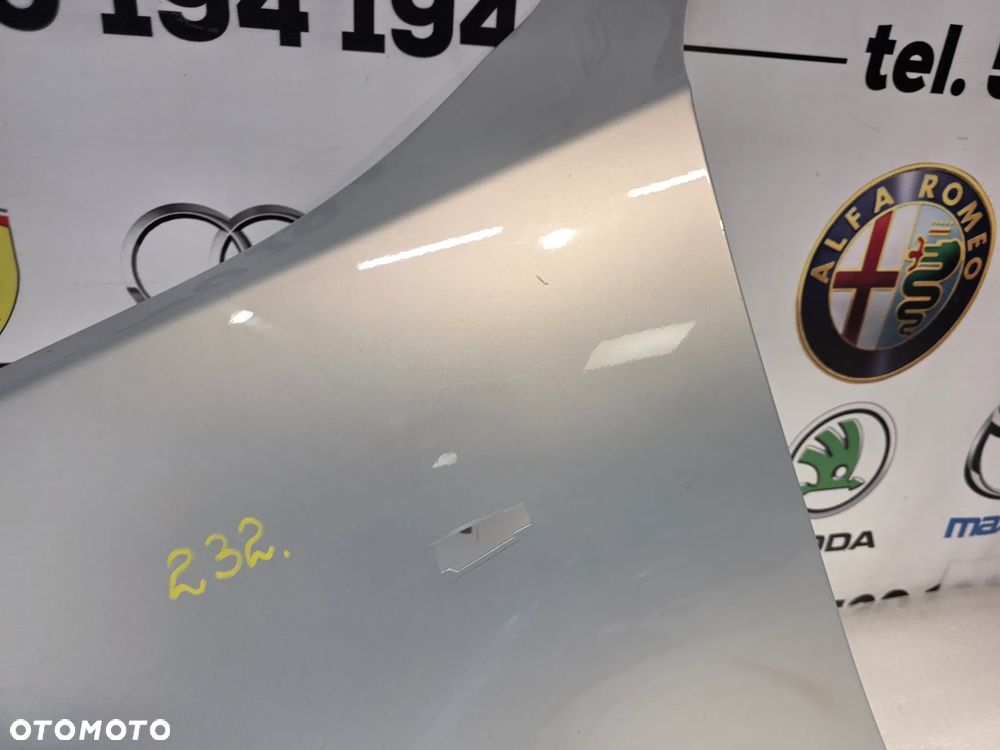BMW E60 / E61 LEWY BŁOTNIK PRZEDNI PRZÓD NR AUKCJI BŁ232 - 4