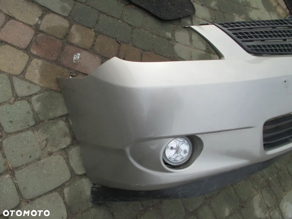 Zderzak TOYOTA COROLLA VERSO + HALOGEN, GRILL 1D9 - 2