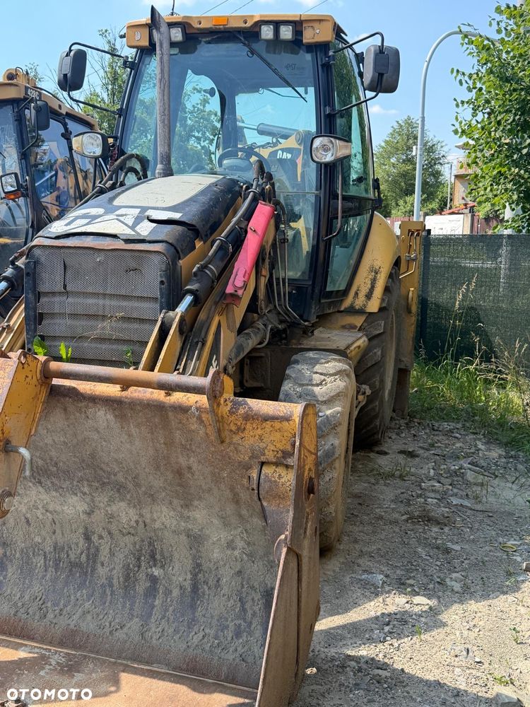 Caterpillar 428E - 7