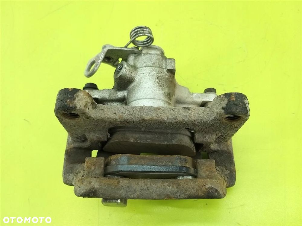 Zacisk hamulcowy tył lewy VW Transporter  T4 1992-2003 - 1