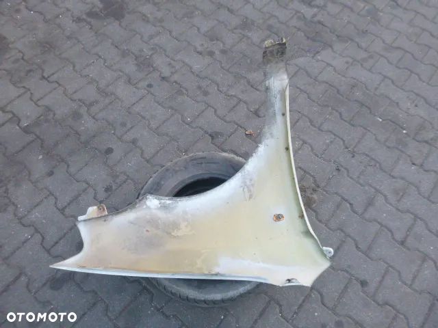 BŁOTNIK LEWY PRZÓD LEWY PRZEDNI DAEWOO KALOS KOLOR 95U - 9
