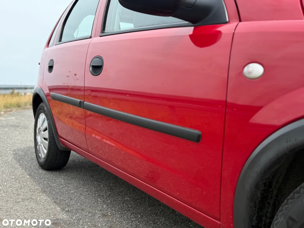 Opel Corsa 1.2 16V Essentia - 11