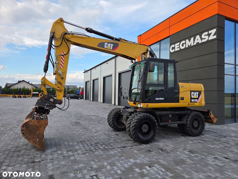 Caterpillar 313D / ze Szwajcarii / tylko 8100 mth /
