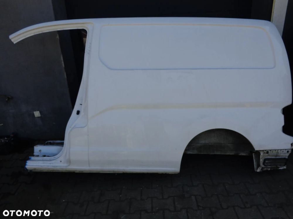 NISSAN NV200 blotnik lewy tylny lak QM1 - 1