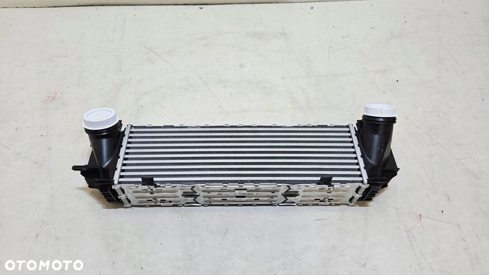 chłodnica powietrza intercooler bmw f10 f07 gt lci f11 nowa 7618768-03 - 2