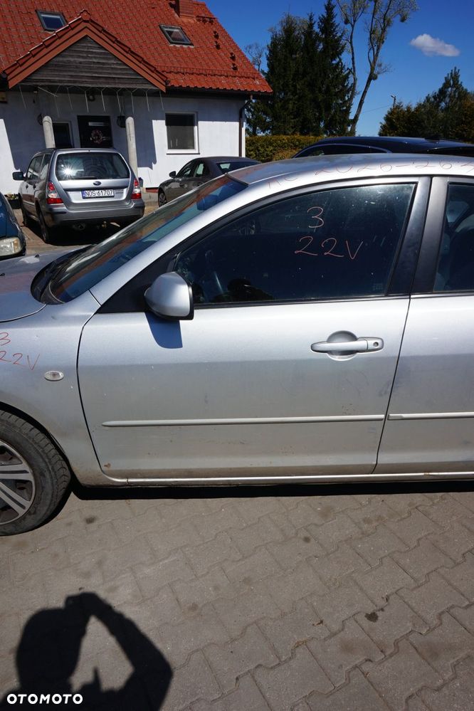 DRZWI PRZEDNIE LEWE 3 I BK SEDAN 22V  SREBRNY MAZDA 2003-2006 - 1