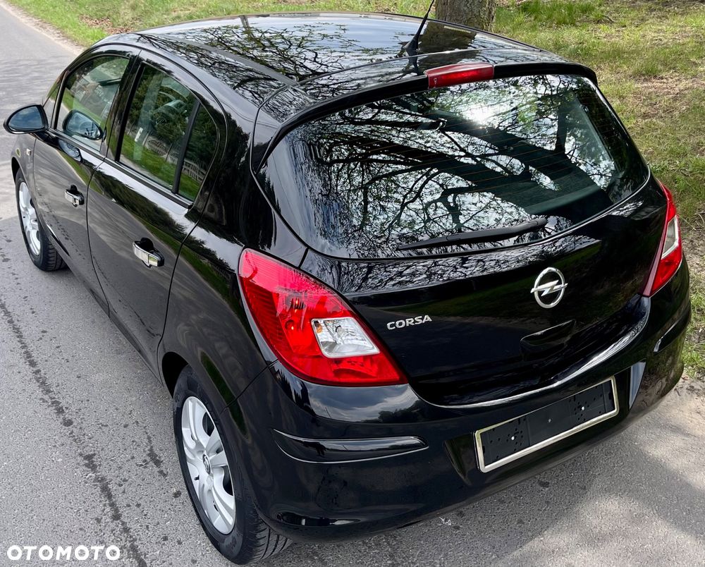 Opel Corsa 1.2 16V Cosmo - 34
