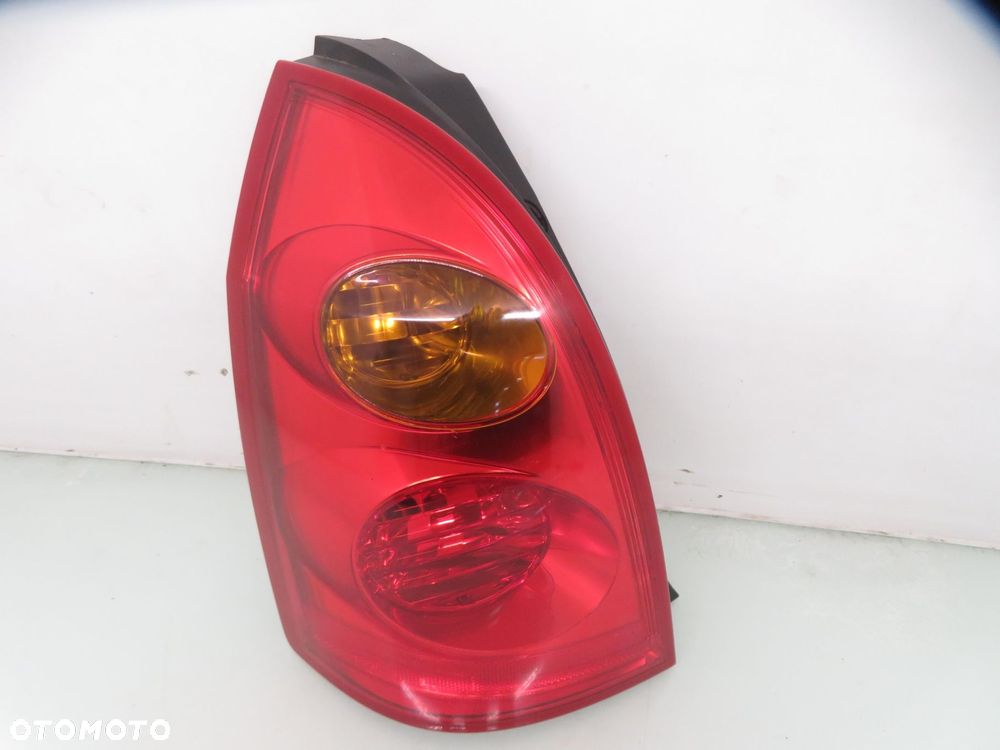 LAMPA LEWA TYLNA NISSAN PRIMERA P12 KOMBI  89077086 - 9