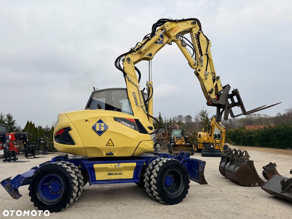 Mecalac Koparka 14 ton MECALAC 15 MWR koparko-ładowarka 3 łyżki widły 1 wł Centr.smarowanie Opony na BLIŹNIAKU 80%Camso ładowarka 714 12MTX 4x4 skrętne KLIMA kabina Premium silnik 146KM volvo EW140B DEUTZ szybka 35km/h - 34